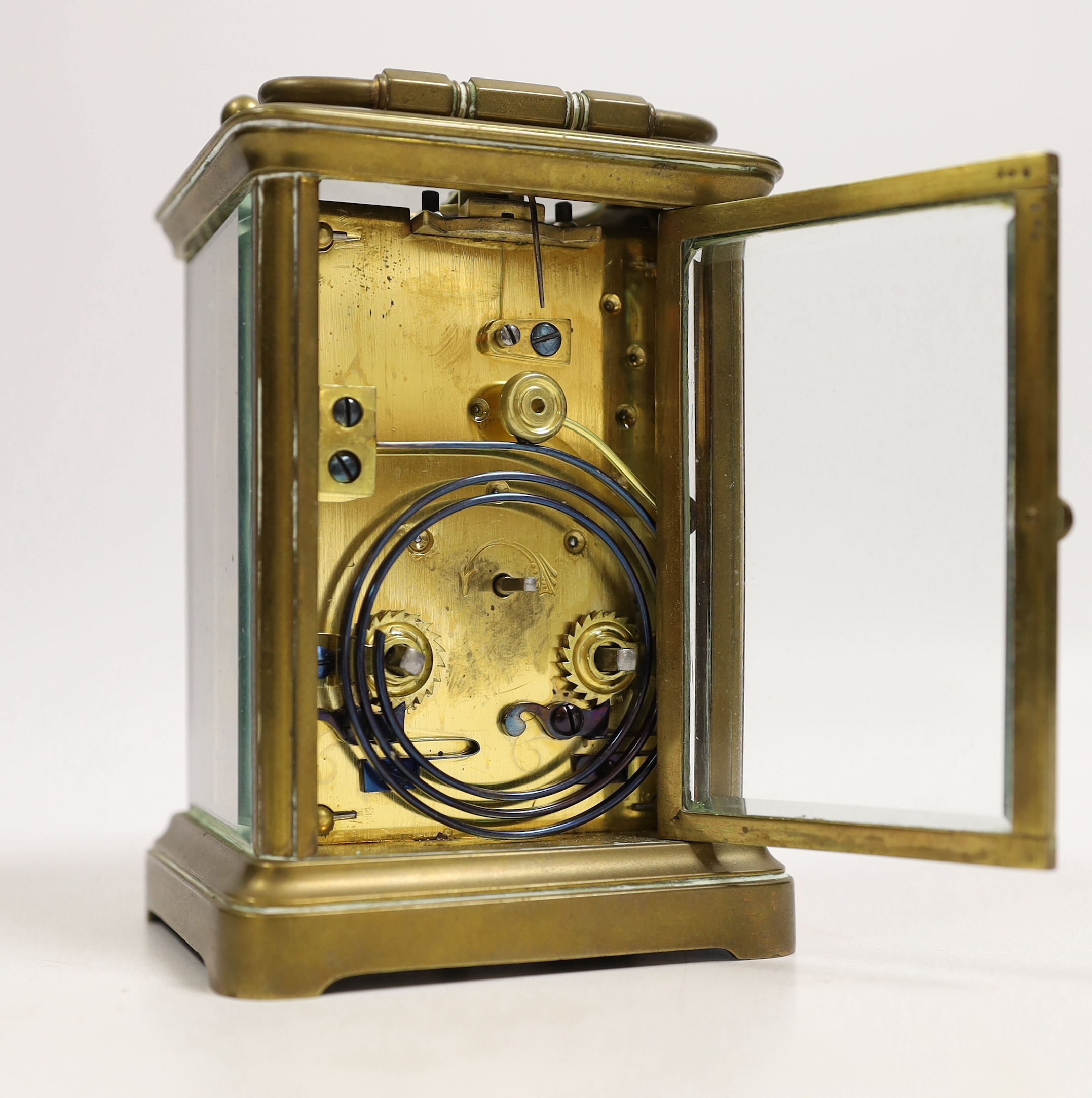 A brass carriage timepiece with travelling case, 11cm